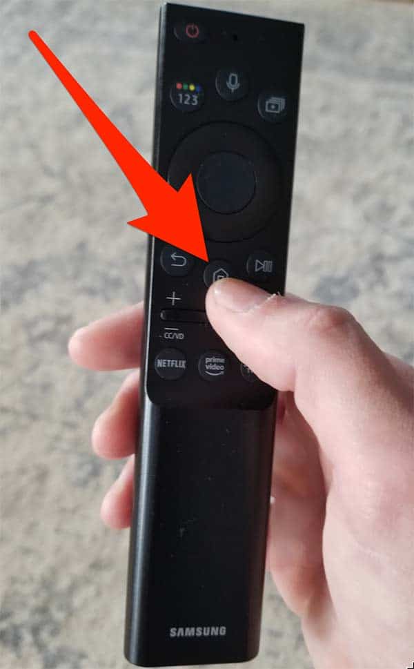 A Home button on a Samsung Smart TV Remote